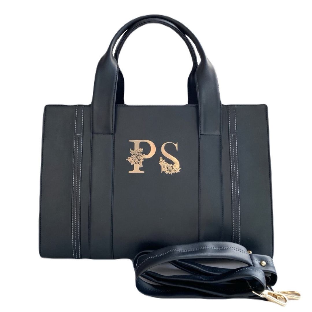 Alpya black Metro tote with floral initials